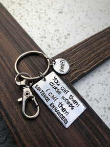 “Sentence Enhancers” Keychain